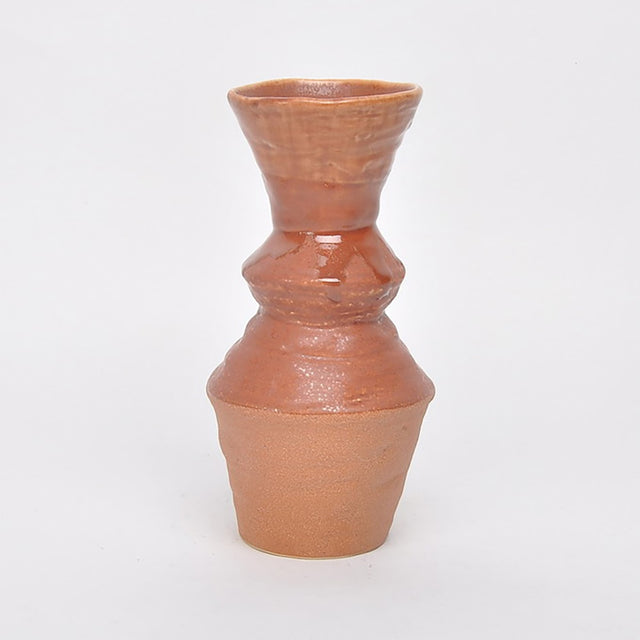 Amber vase with rustic charm and modern elegance, featuring 3/4 glazed finish and organic design, 123 x 123 x 245MM.