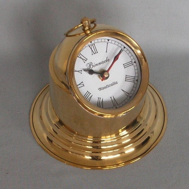 Brass Binacle Clock (10cm) showcasing vintage nautical design, perfect for marine enthusiasts and home decor.