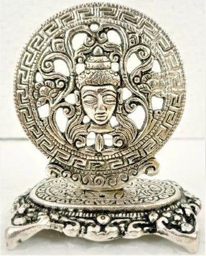 White metal round Buddha head incense holder (9cm) with intricate detailing, perfect for meditation and creating a peaceful ambiance.