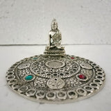 White metal round Buddha incense holder (10cm) with serene design, ideal for meditation and clean, calming spaces.