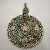 White metal round incense holder featuring a serene Buddha design, perfect for meditation and enhancing spiritual spaces.