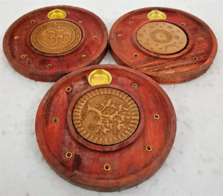 Set of 3 elegant round incense holders with intricate laser-cut logos for a serene ambiance in any space.