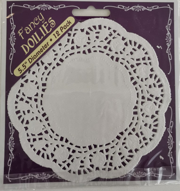 Exquisite 5.5" paper doilies in a pack of 12, perfect for elegant table decor and creative crafts.