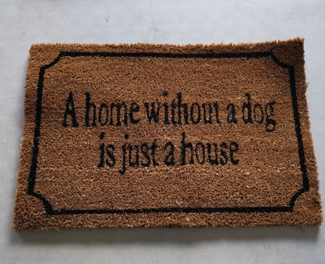 Coir doormat featuring "A Home Without A Cat Is Just A House," perfect for cat lovers and durable for any entryway.