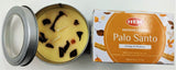 Eco-friendly Palo Santo candle in a 90 gm tin, promoting relaxation and spiritual cleansing through soothing aroma.