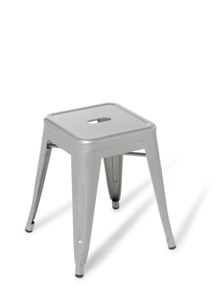 Sleek silver low stool with sturdy steel frame, ideal for modern spaces and easy to stack; seat height 457mm.