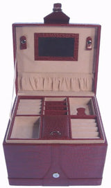 Elegant jewellery box in croc PU with velvet lining, featuring a handle and large compartment for organized storage of accessories.
