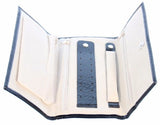 Compact Jewelry Roll with multiple compartments for organized travel storage, keeping jewelry safe and untangled.