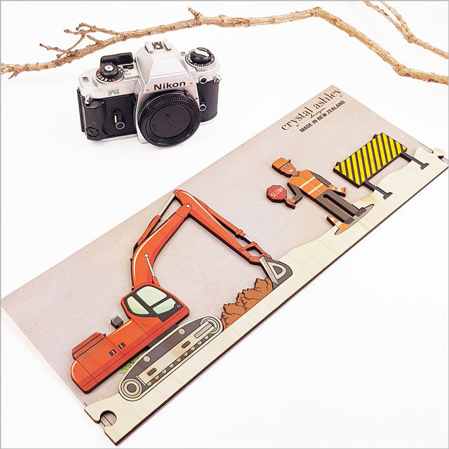 Pine Jigsaw Strip Construction Site 2 wall art featuring vibrant, eco-friendly puzzle pieces ideal for playful decor.