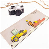 Pine jigsaw puzzle wall art featuring a construction site theme, crafted from eco-friendly pine veneer for playful decor.