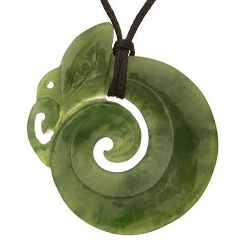 Jade Manaia Koru Pendant, handcrafted Nephrite Jade with protective Manaia and Koru symbols, on adjustable black wax cord.