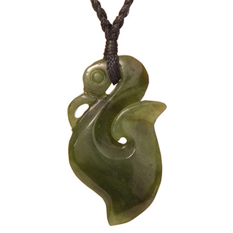 Jade Manaia hook pendant necklace in greenstone on a braided black cord, symbolizing protection and good fortune.