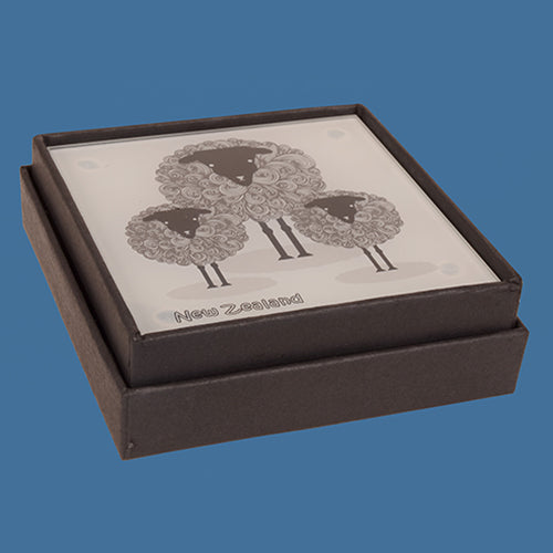 Set of 4 durable tempered glass coasters featuring charming sheep designs, celebrating New Zealand's sheep farming heritage.