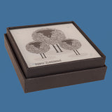 Set of 4 durable tempered glass coasters featuring charming sheep designs, celebrating New Zealand's sheep farming heritage.