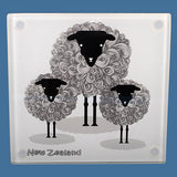 Stylish tempered glass coasters featuring sheep designs, celebrating New Zealand's sheep farming heritage. Set of 4.