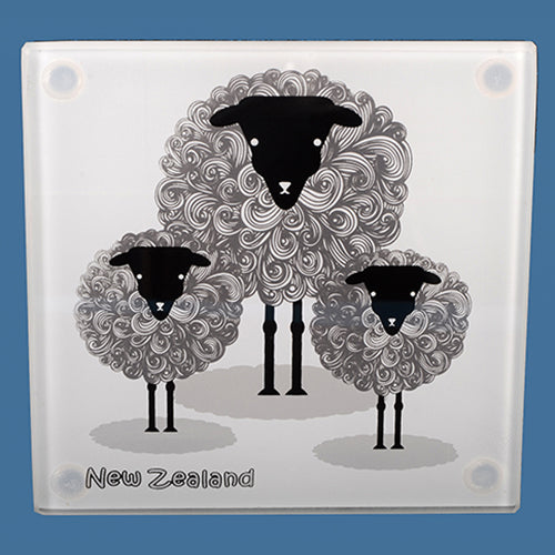 Stylish tempered glass coasters featuring sheep designs, celebrating New Zealand's sheep farming heritage. Set of 4.