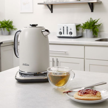 White Sunbeam Alinea™ Select kettle with 1.7L capacity, precise temperature control, and 360° cordless base for elegant brewing.
