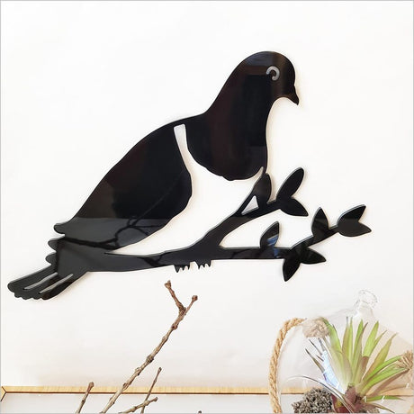 Kiwiana wall art featuring a Kereru perched on a branch, crafted from durable ACM in a sleek black finish.