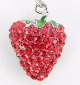 Vibrant strawberry keychain with sparkling crystals, perfect for bags or keys, combines whimsy with elegance.