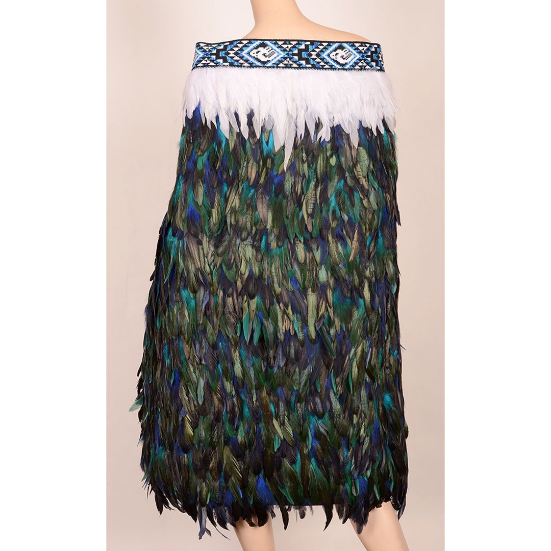 Modern Korowai - Paua cloak, featuring vibrant feathers and taniko trim, symbolizing Maori culture and heritage.