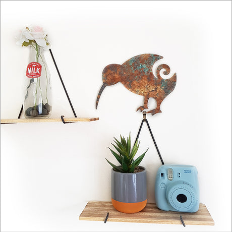 ACM Wall Art featuring a Kiwi and koru design in copper patina, ideal for indoor or outdoor decor, 238mm x 180mm.