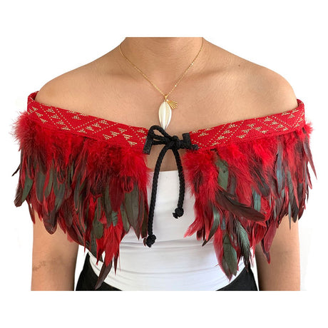 Korowai Cape Red: Elegant M?ori cloak with vibrant feathers, adjustable fit, and symbolic Marena design for special occasions.