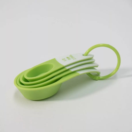 Set of 4 durable plastic measuring spoons for precise cooking: 1 tbsp, 1/2 tbsp, 1 tsp, 1/2 tsp; dishwasher safe.