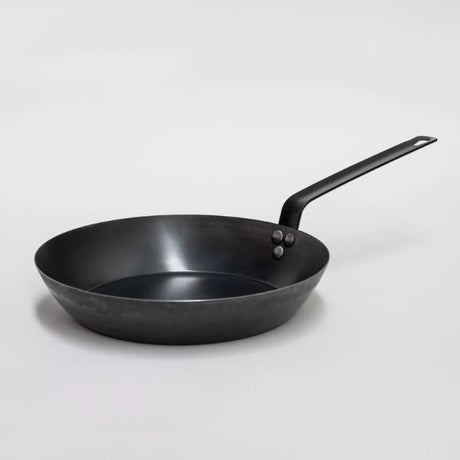 30cm black iron fry pan with ergonomic handle, perfect for searing, frying, and sautéing on all stovetops.