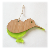 Kiwi ornament made of eco-friendly bamboo and vibrant satin acrylic in lime, featuring intricate details and easy to hang.
