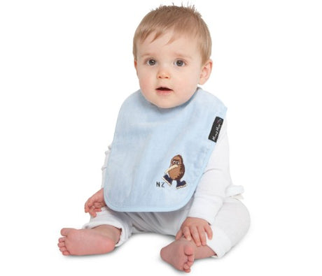 Kiwiana Wonder Bib in Baby Blue features a playful Kiwi design, super-absorbent cotton, and water-resistant backing for stylish protection.