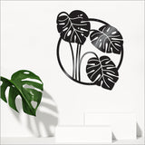 Large white circle wall art featuring a monstera deliciosa leaf, perfect for indoor and outdoor decor.