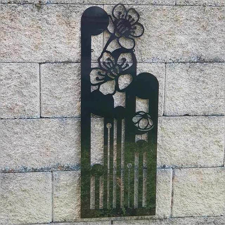 Large Koru Manuka wall art in sleek black, 790mm, crafted from durable ACM, ideal for enhancing indoor or outdoor spaces.