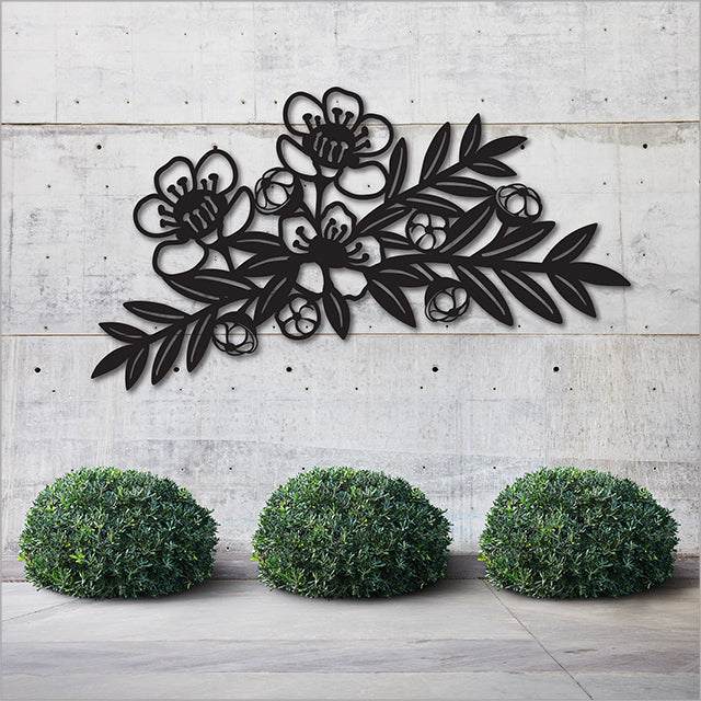 Large black Manuka branch wall art made from durable Aluminium Composite, ideal for enhancing indoor or outdoor spaces.