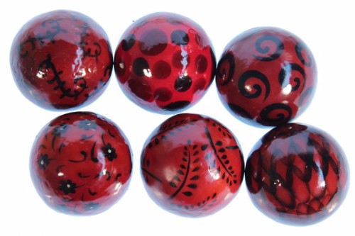 Set of 6 assorted 3-inch decorative balls made from natural capiz shells with pearlescent sheen and unique patterns.
