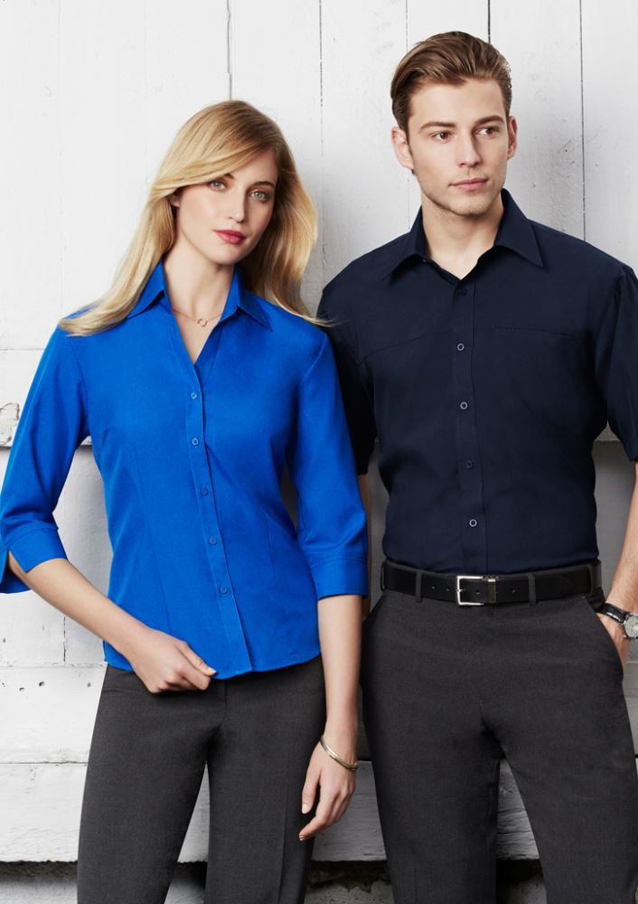 Ladies white 3/4 sleeve shirt in size 24, featuring breathable fabric, UPF protection, and a stylish curved hem.