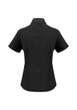 Ladies black short sleeve shirt in size 12, featuring UPF protection, breathable fabric, and a stylish curved hem.
