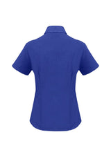Electric blue short sleeve shirt for women, size 22, made from breathable polyester with curved hem and open neckline.