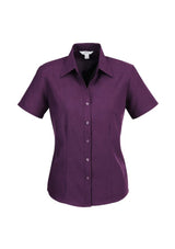 Ladies Grape Short Sleeve Shirt from Biz Collection, featuring breathable fabric, open neckline, and curved hem for stylish versatility.