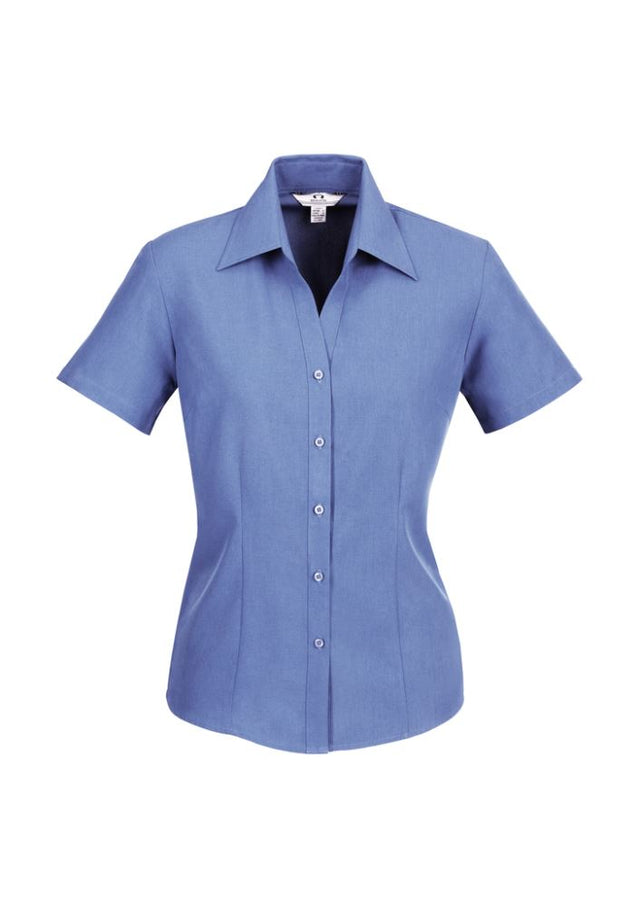 Ladies Plain Oasis Short Sleeve Shirt in Mid Blue, size 22, crafted from breathable polyester with sun protection and a flattering design.