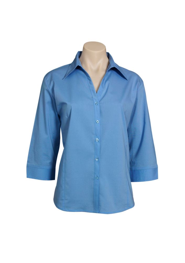 Mid blue 3/4 sleeve women's shirt in size 22, featuring an open neckline, cuffed sleeves, and curved hem for versatile styling.