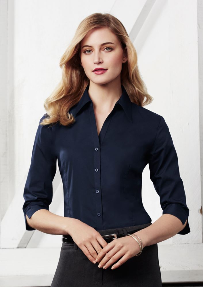 Cherry 3/4 sleeve shirt for women, featuring a flattering open neckline, cuffed sleeves, and a stylish curved hemline.