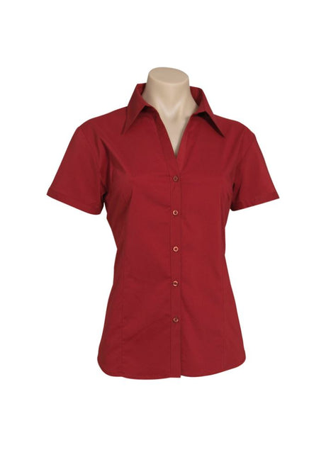 Ladies Metro Short Sleeve Shirt in cherry, size 26; features UPF protection, cuffed sleeves, and a stylish curved hemline.
