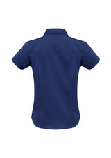 Royal blue short sleeve shirt for ladies, size 6, featuring cuffed sleeves, UPF protection, and a stylish, comfortable fit.