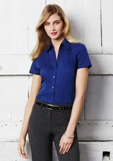 Ladies Metro Short Sleeve Shirt in royal blue, Size 6, featuring cuffed sleeves, open neckline, and a flattering fit.