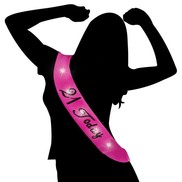 Glowing pink LED sash with '21 Today' message for celebrating a stylish 21st birthday. Perfect for parties and photos.