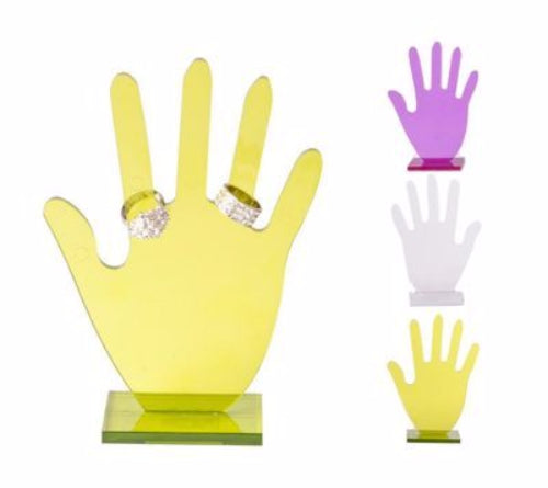 Modern pink acrylic ring holder shaped like a hand, stylishly displaying and organizing rings while ensuring safety.