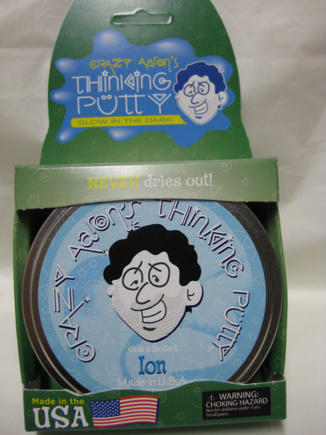 Crazy Aaron's Ion Glow In The Dark Thinking Putty transforming from milky white to icy blue in dim light for sensory play.