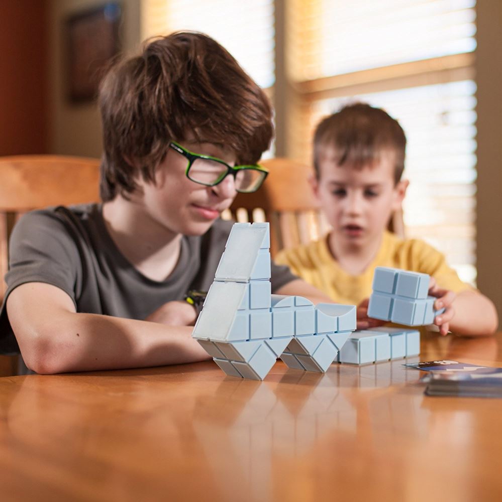 Engaging set of 6 uniquely hinged cubes for kids 5+, promoting creativity, problem-solving, and fun architectural exploration.