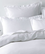 Californian King Duvet Cover Set Nova in white, featuring soft 100% cotton waffle and elegant 4cm tailored flange.