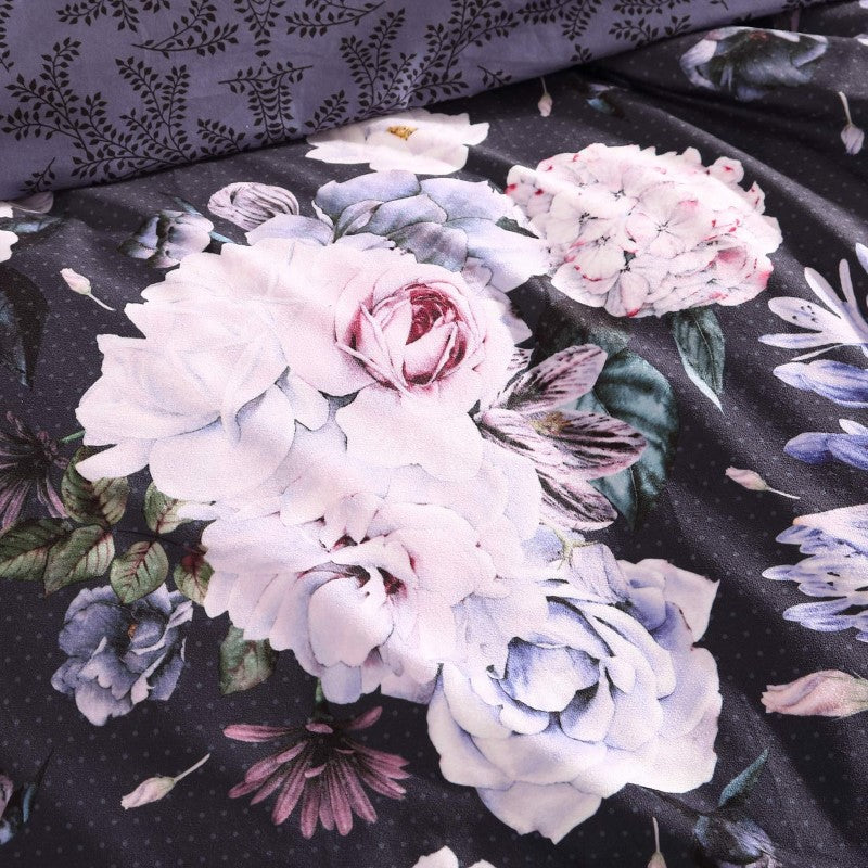 Super King duvet cover set in violet floral design, soft velvet fabric, includes duvet cover and two pillowcases.